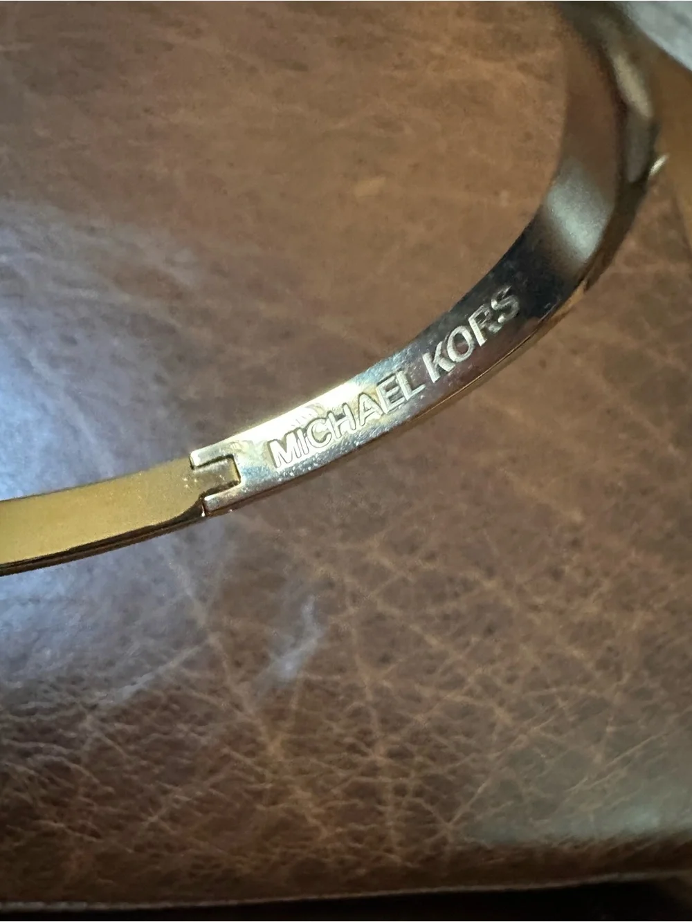 Michael Kors polished gold